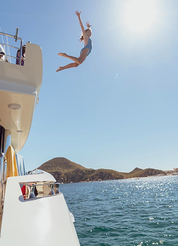 jumping off a yacht boat, yacht trip cabo fun,